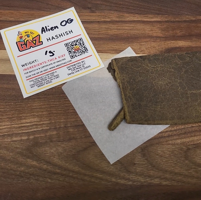 a brick of alien og hashish displayed for We Got Gaz